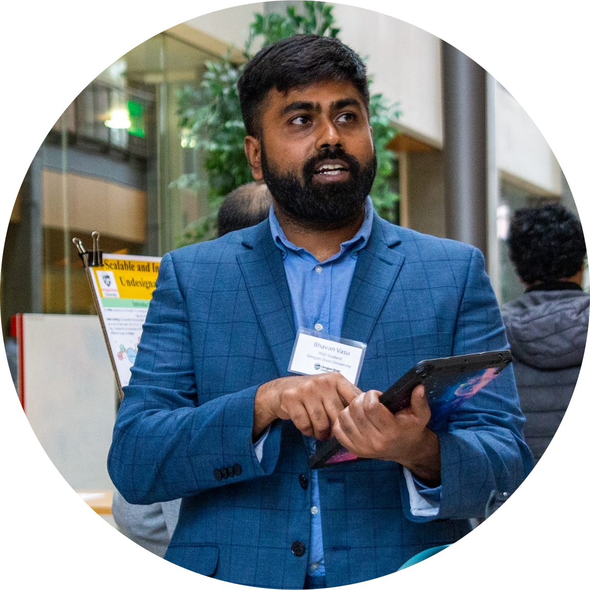Bhavan Vasu presenting research at an academic event